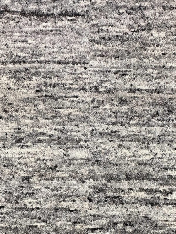 Gray textured carpet close-up view