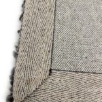 Close-up of woven fabric with herringbone pattern