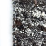 Close-up of textured wool fabric.