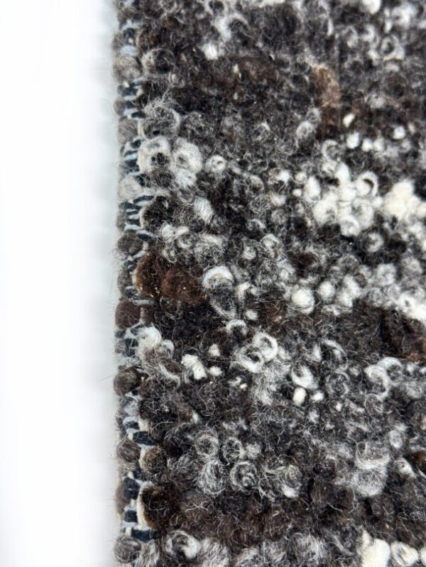 Close-up of textured wool fabric.