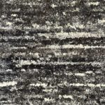 Close-up of textured gray and white carpet design.