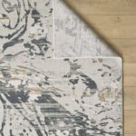 Abstract art rug on wooden floor