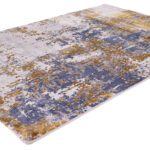 Abstract blue and gold area rug design.