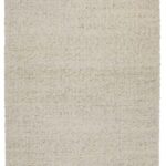 Beige textured area rug