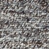 Close-up of textured, mottled brown and white fabric.