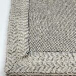 Gray woven textile with border design