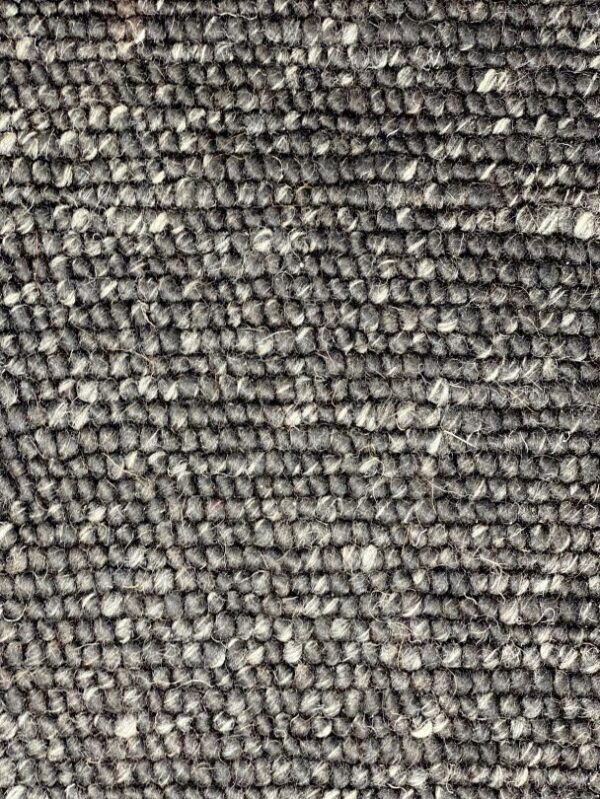 Close-up of woven wool textile texture.