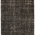 Dark textured area rug with woven pattern