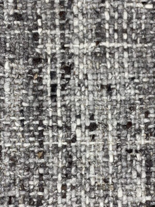 Close-up of gray woven fabric texture.