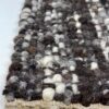 Close-up of textured wool woven rug