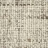 Beige textured woven fabric close-up