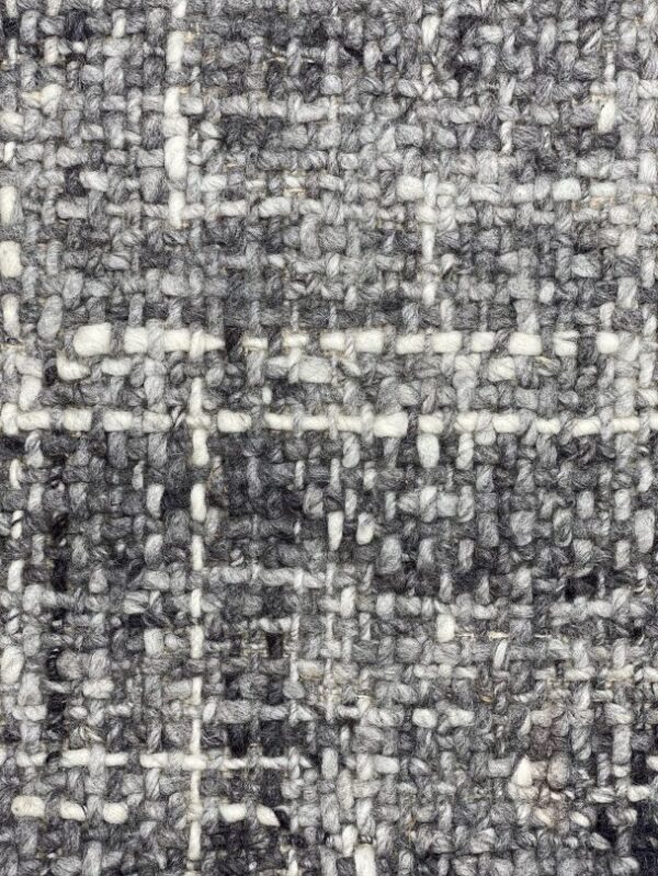 Close-up of gray woven fabric texture.