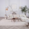 Elegant living room with white sectional sofa.