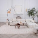 Elegant living room with white sectional sofa.