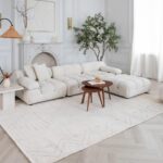 Elegant white living room with modern furniture.