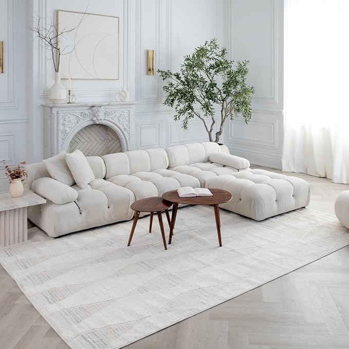 Elegant living room with white sectional sofa.