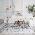 Modern living room with white sectional sofa