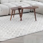 Modern carpet with geometric pattern in living area.