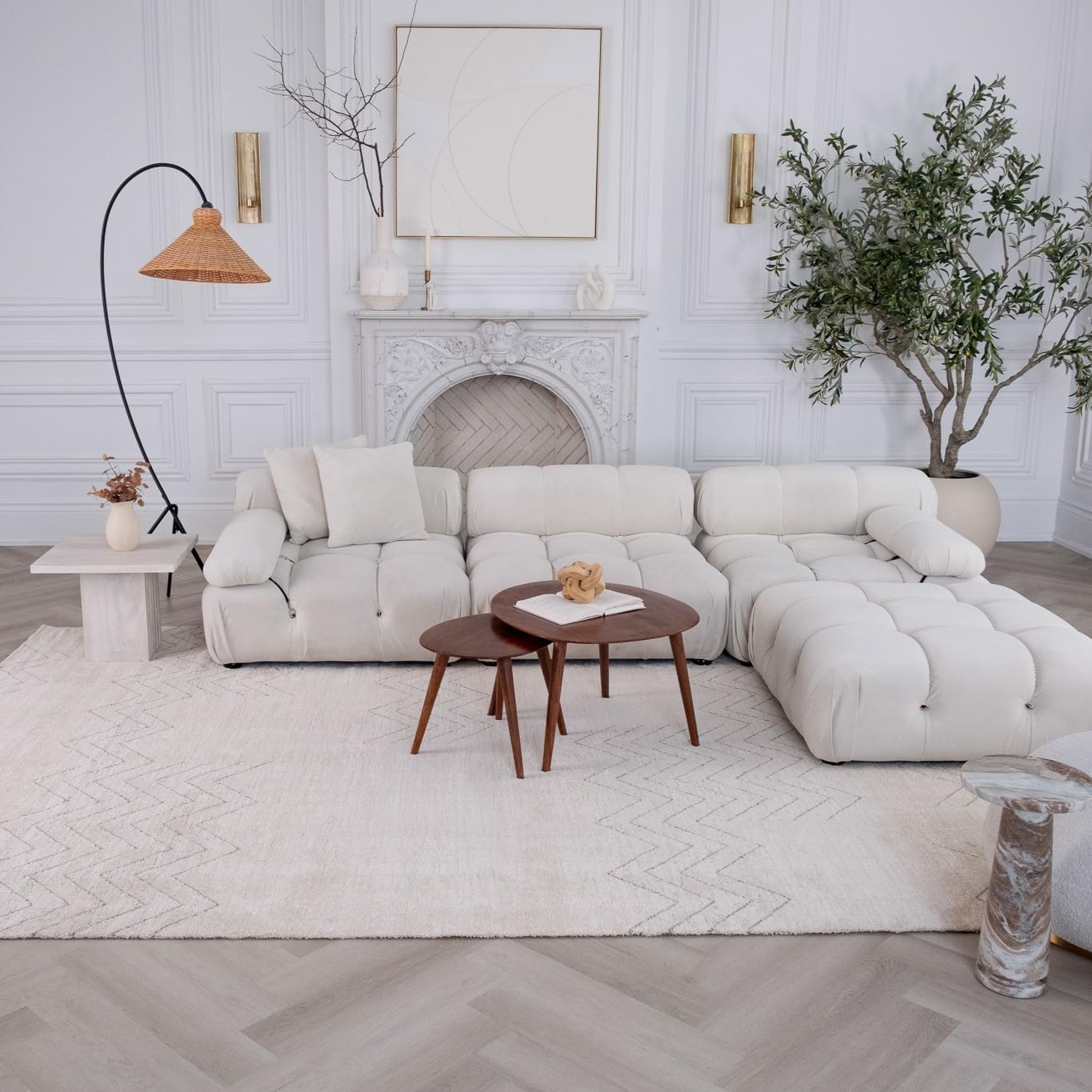 Modern living room with white sofa and decor.