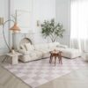 Elegant living room with white sectional sofa.