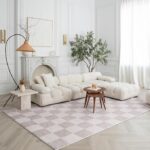 Elegant living room with white sectional sofa.