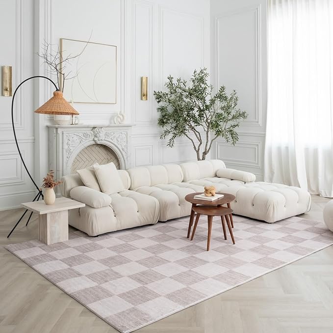 Elegant living room with white sectional sofa.