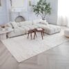 Modern living room with white sofa and decor