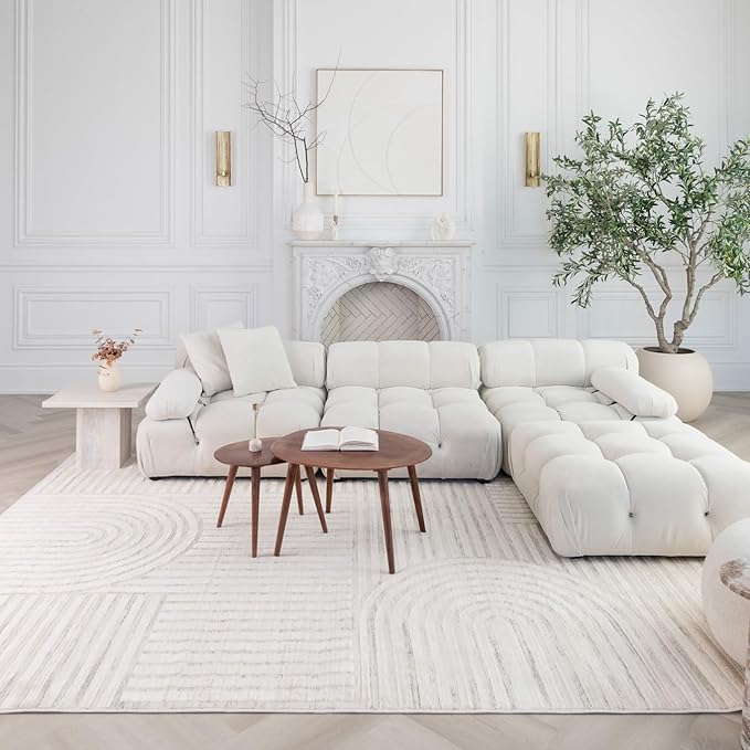 Elegant living room with white sectional sofa.