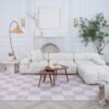 Modern living room with white sectional sofa.