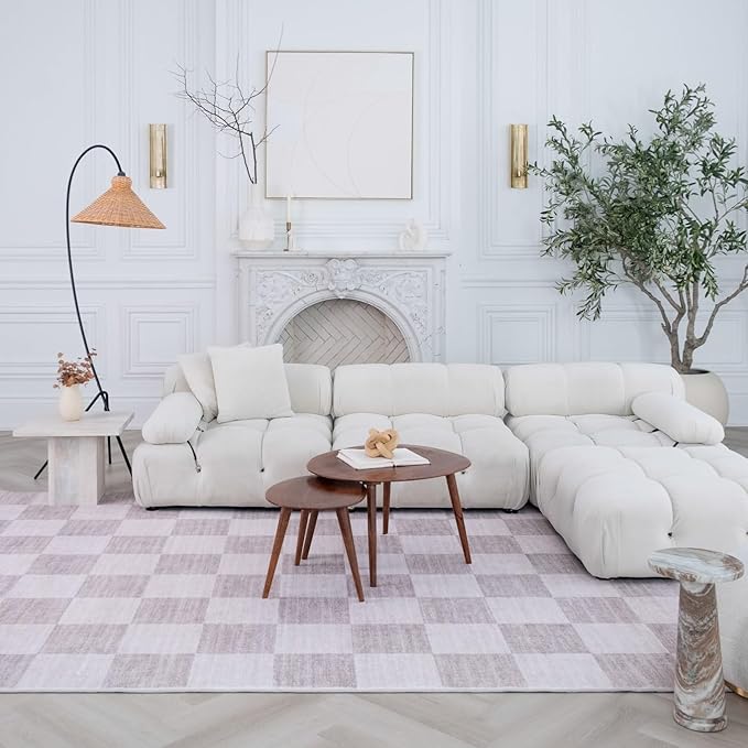 Modern living room with white sectional sofa.
