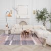 Modern living room with white sofa and decor.