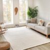 Cozy living room with sofa and decor.