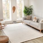 Cozy living room with sofa and decor.
