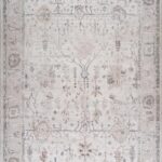 Beige vintage floral patterned rug.