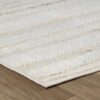 White textured rug on wooden floor