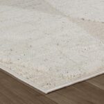 Textured white carpet on wooden floor