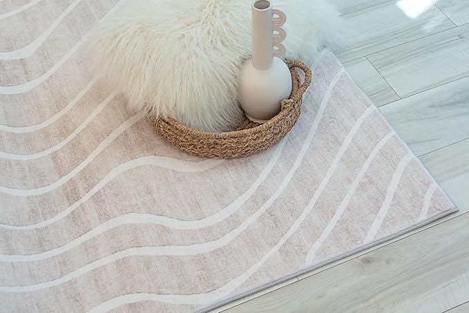 White rug with vase and fluffy cushion