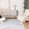 Modern living room with abstract rug and sofa