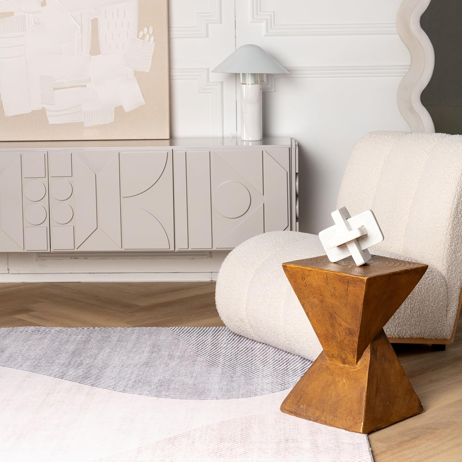 Modern interior with abstract decor and cozy furniture.