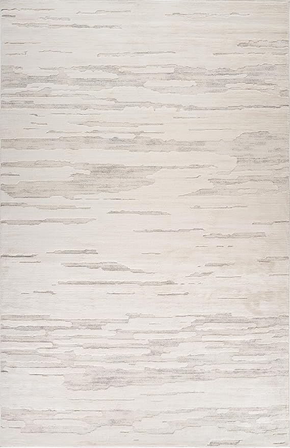 Cream-colored rug with subtle textured pattern.