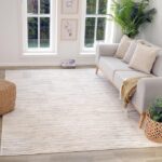 Modern living room with gray rug and sofa