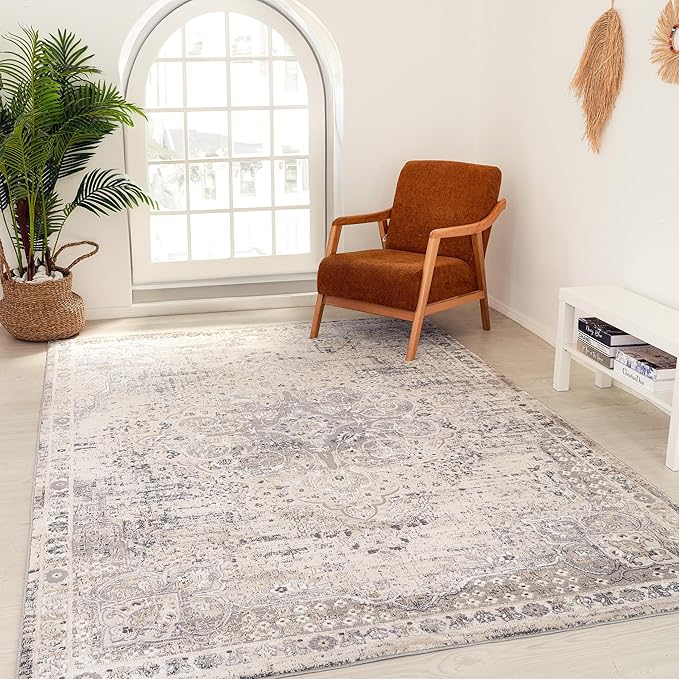 Elegant living room with armchair and patterned rug.