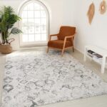 Boho living room with patterned rug and chair.