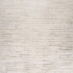 Textured beige area rug with subtle lines pattern.
