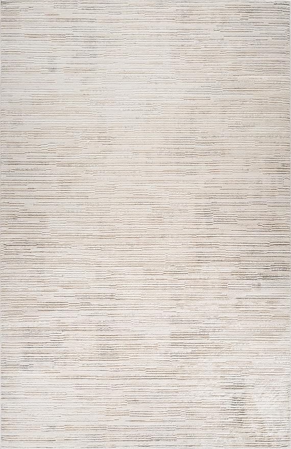 Textured beige area rug with subtle lines pattern.