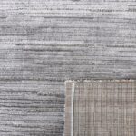 Gray textured carpet with visible weave pattern