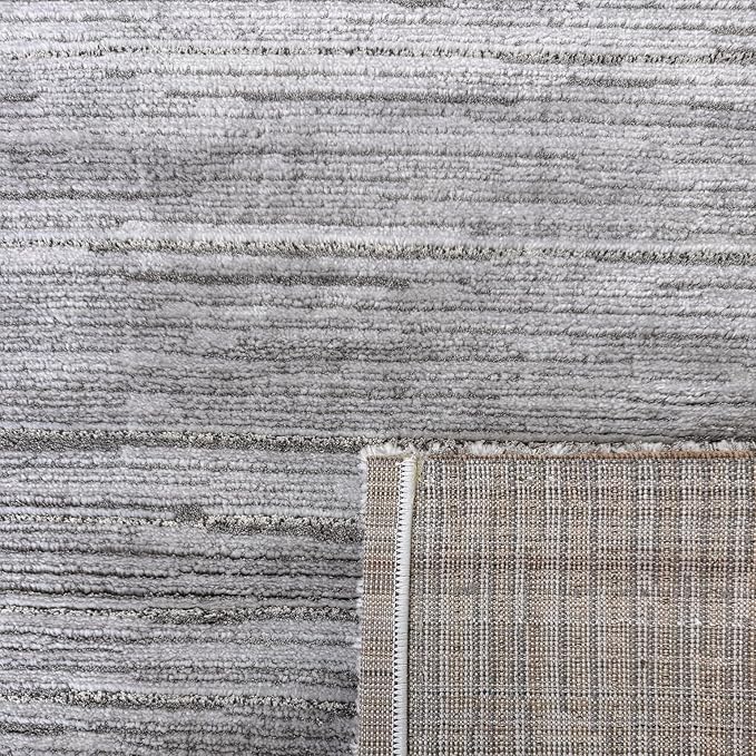Gray textured carpet with visible weave pattern