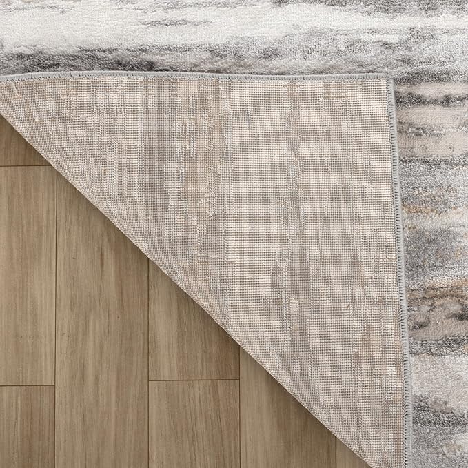 Area rug corner folded on wooden floor