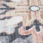 Close-up of patterned rug with floral design