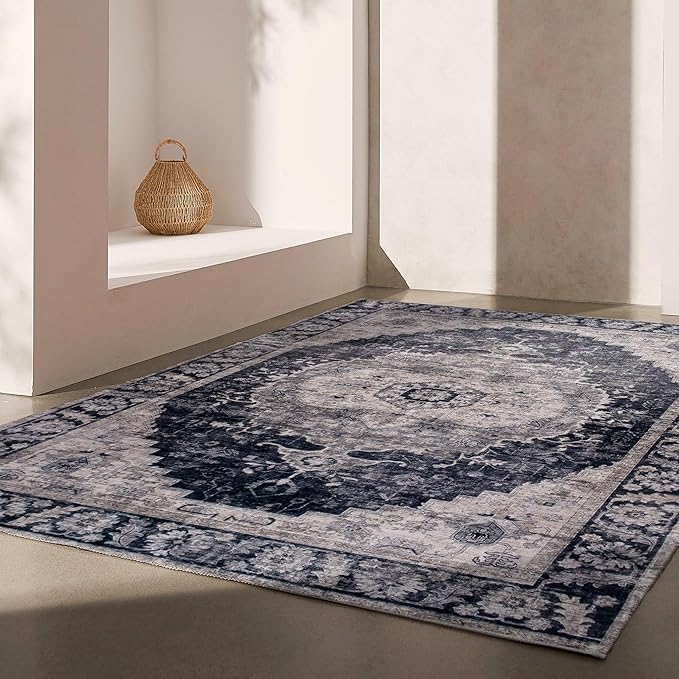 Elegant patterned rug in sunlit room corner.